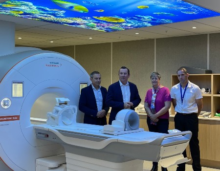 Health Minister, Premier, Kalgoorlie MLA and a MRI technician stand in front of MRI machine