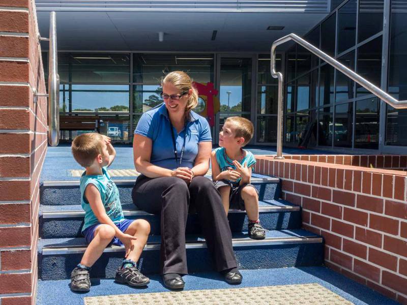 Child health staff with children