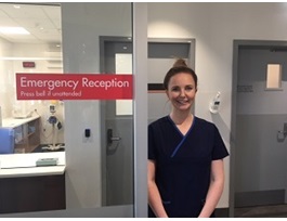 Health professional at Emergency Department reception.