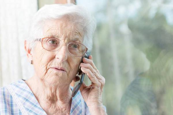 CARE Call - concerned elderly woman on phone