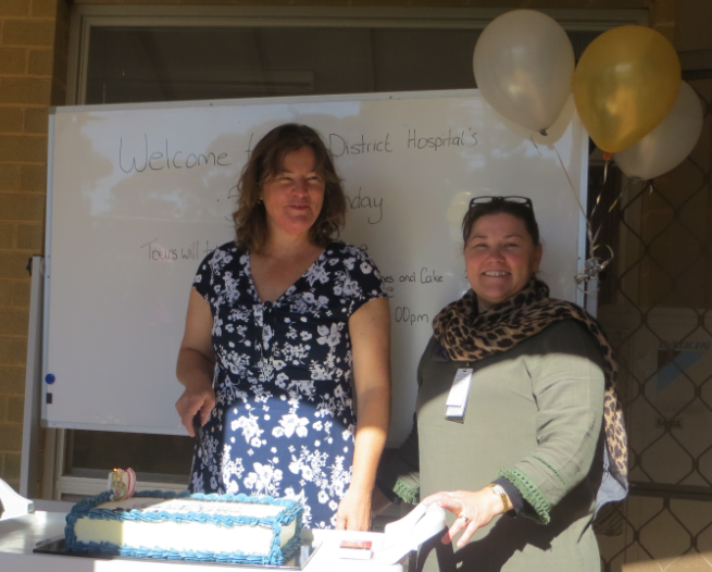 Raelene Blair (first person born in Southern Cross Hospital), cutting the celebratory cake with Diane Dixon – Health Service Manager.