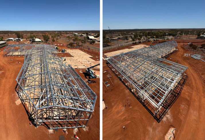 Two photos showing an overhead view of a new hospital showing the steel framework and concrete pad surrounded by a red dirt pad and construction equipment