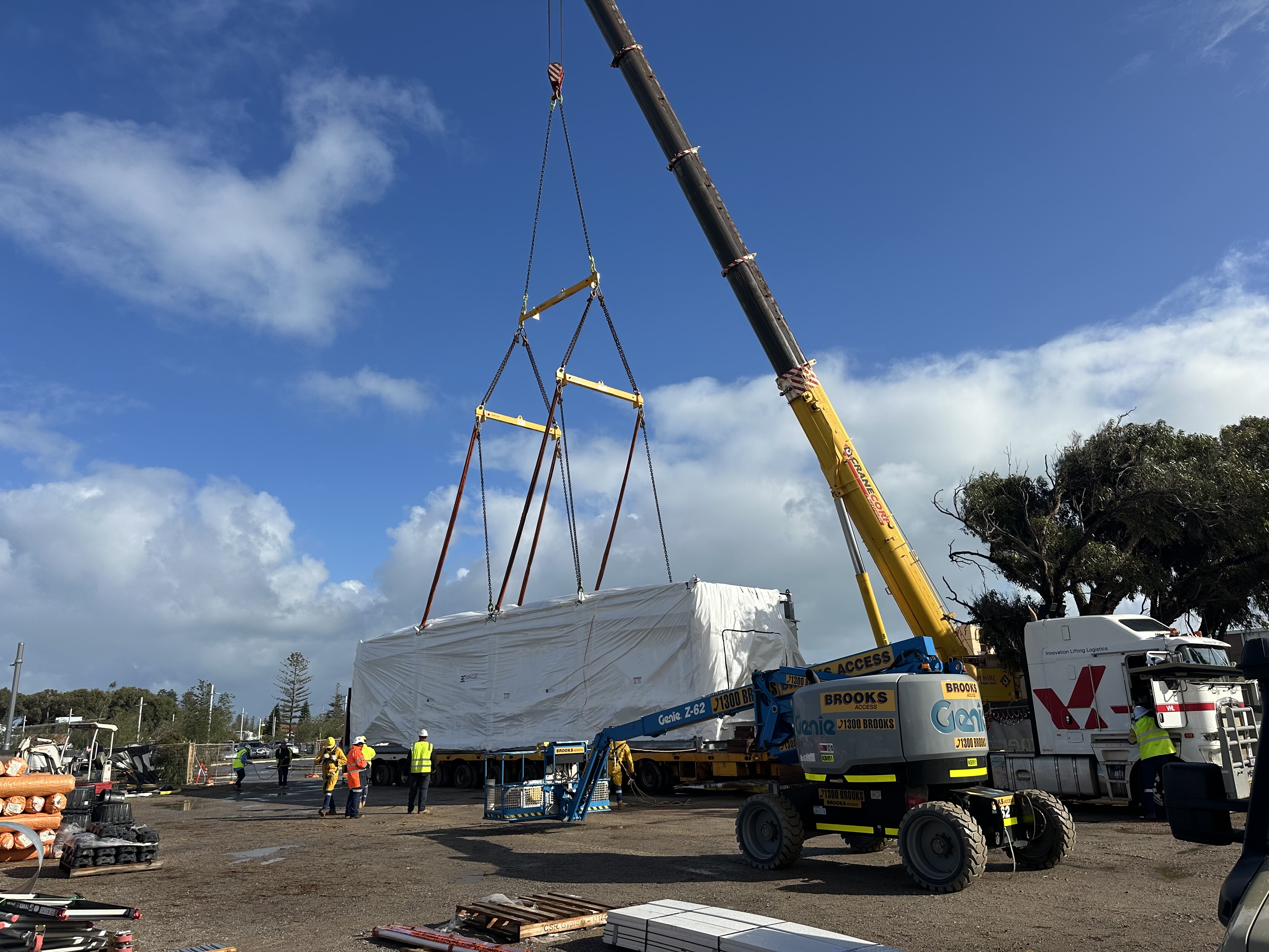 A crane lifts a large piece of the Central Energy Plant into place at the Geraldton Health Campus redevelopment site