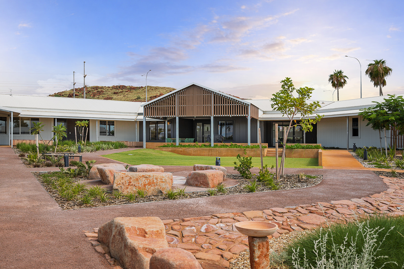 A professional photo shows a bright, brand new modern health facility.
