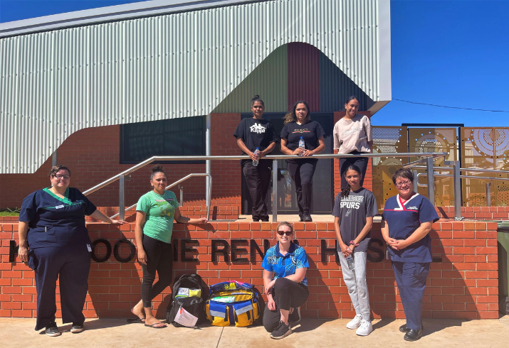 Group of Goldfields mobile vaccination response team out the front of the Kalgoorlie Renal Hostel.