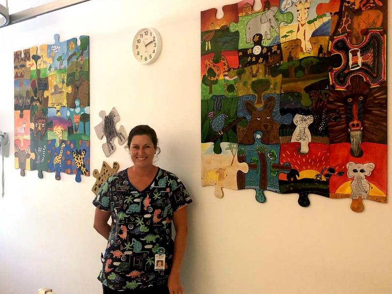 WACHS Bunbury Hospital Clinical Nurse Elli Barrett with some of the jigsaws.